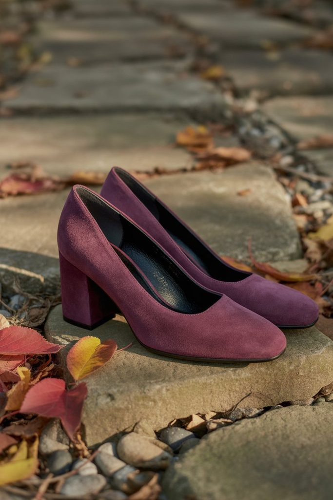Suede block-heel shoes on a gravel path for an outdoor fall wedding