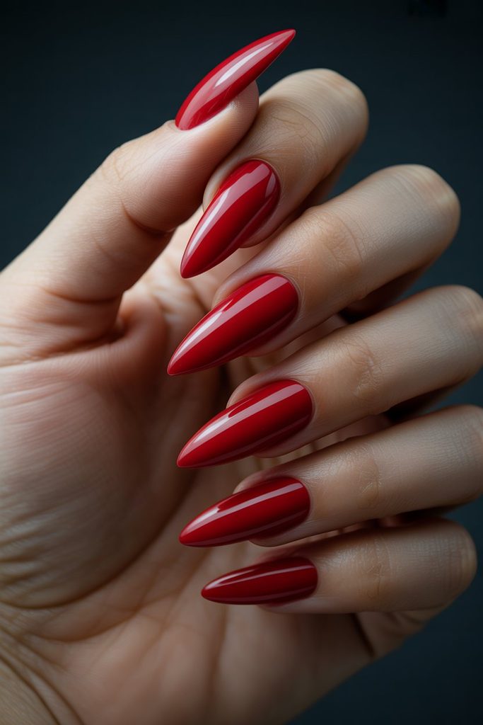 Close-up of long stiletto-shaped nails illustrating a bold bridal nail style