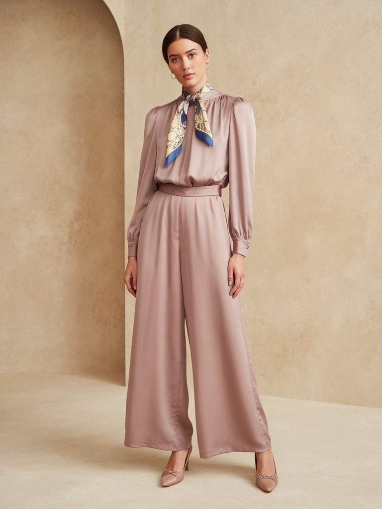 Wide-leg silk jumpsuit styled as a wedding guest alternative to a dress